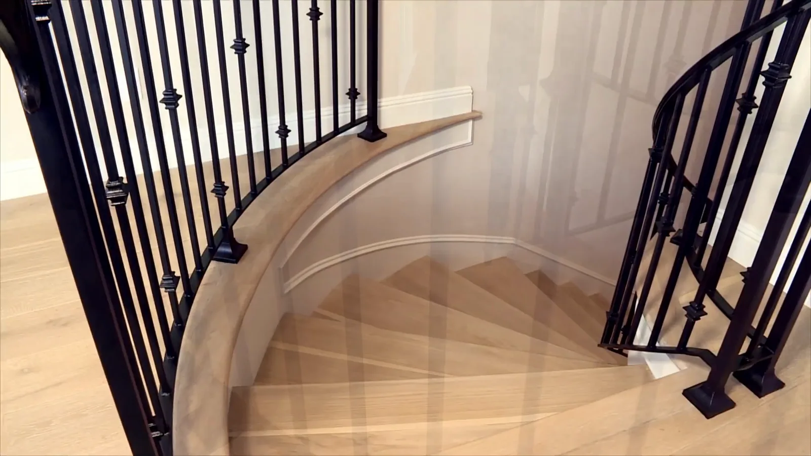 Curved white oak staircase