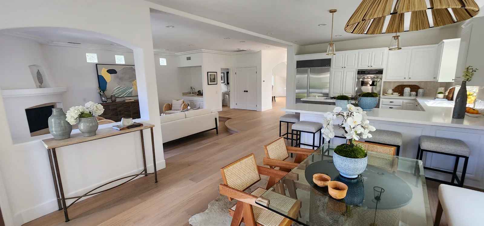 Open kitchen and living area in light oak flooring