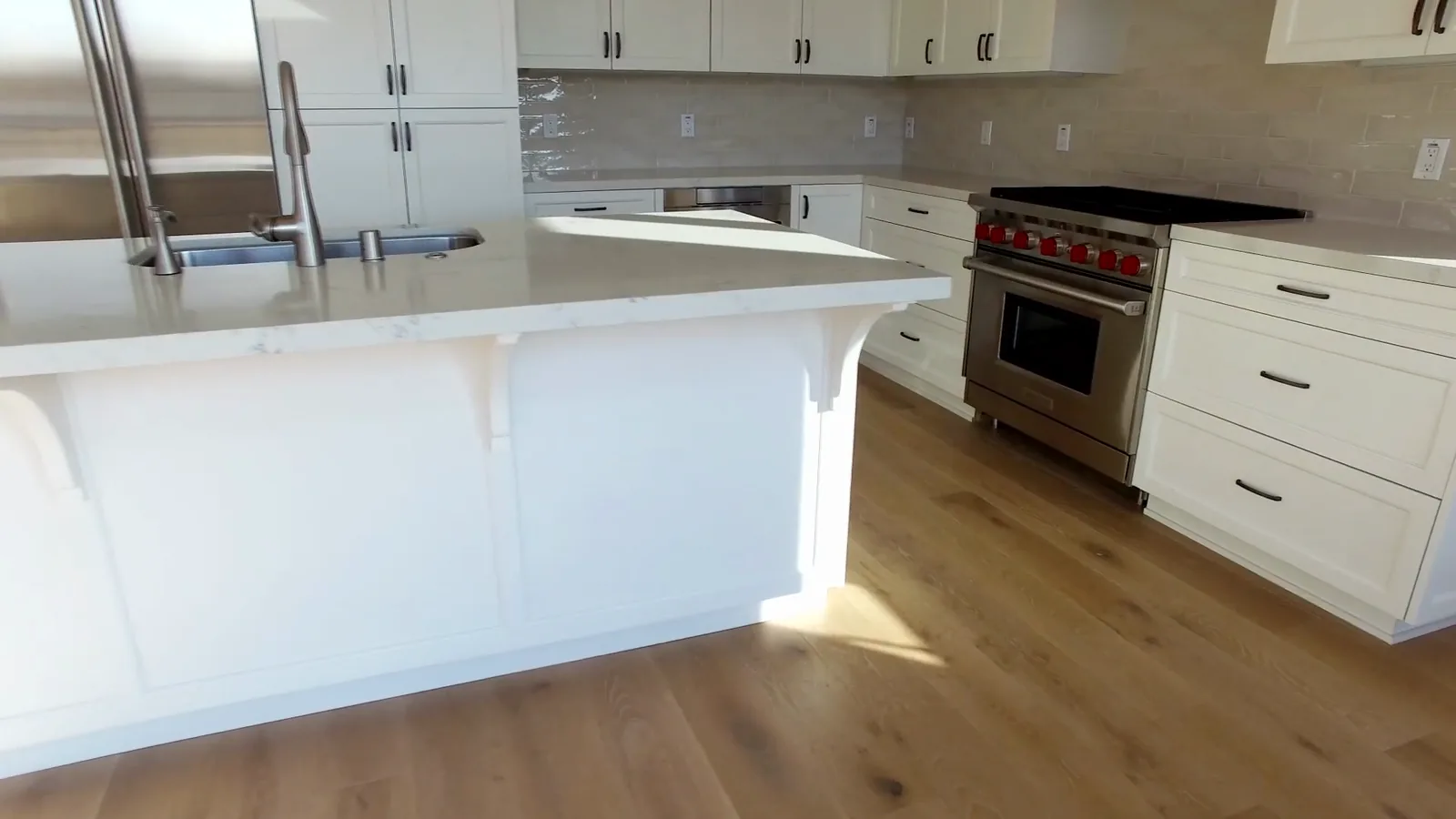 White oak floor around a kitchen island