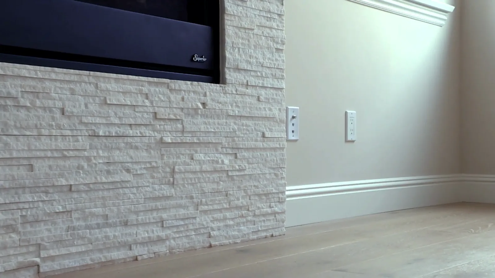 Stone fireplace with oak flooring