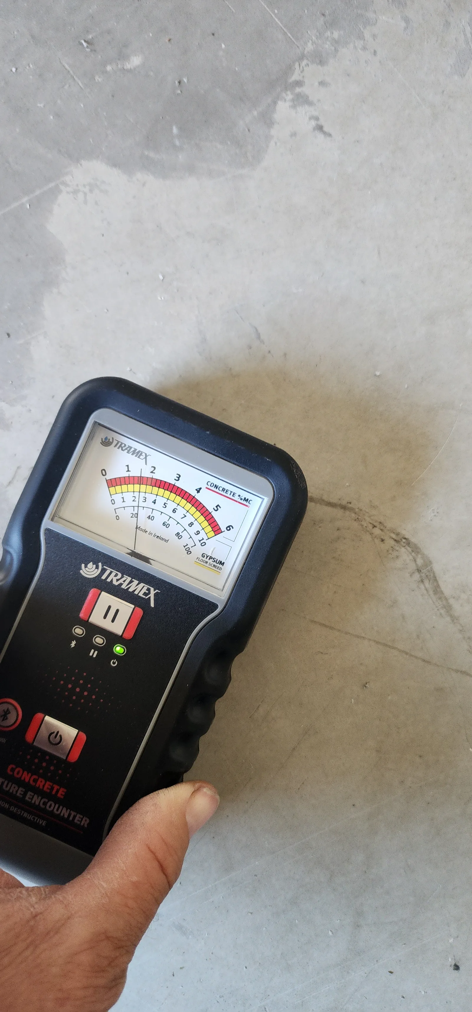 Taking a moisture reading before a floor goes down