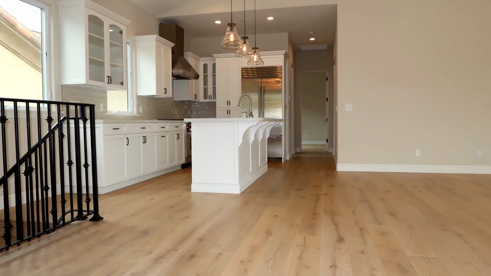 Installer nailing down hardwood planks